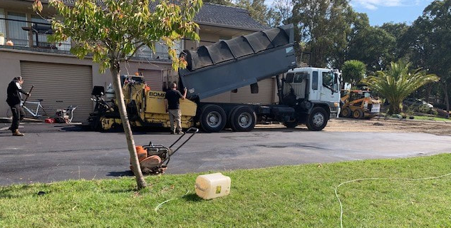This is a photo of an asphalt driveway which is in the process of being installed by Yass Road Tek